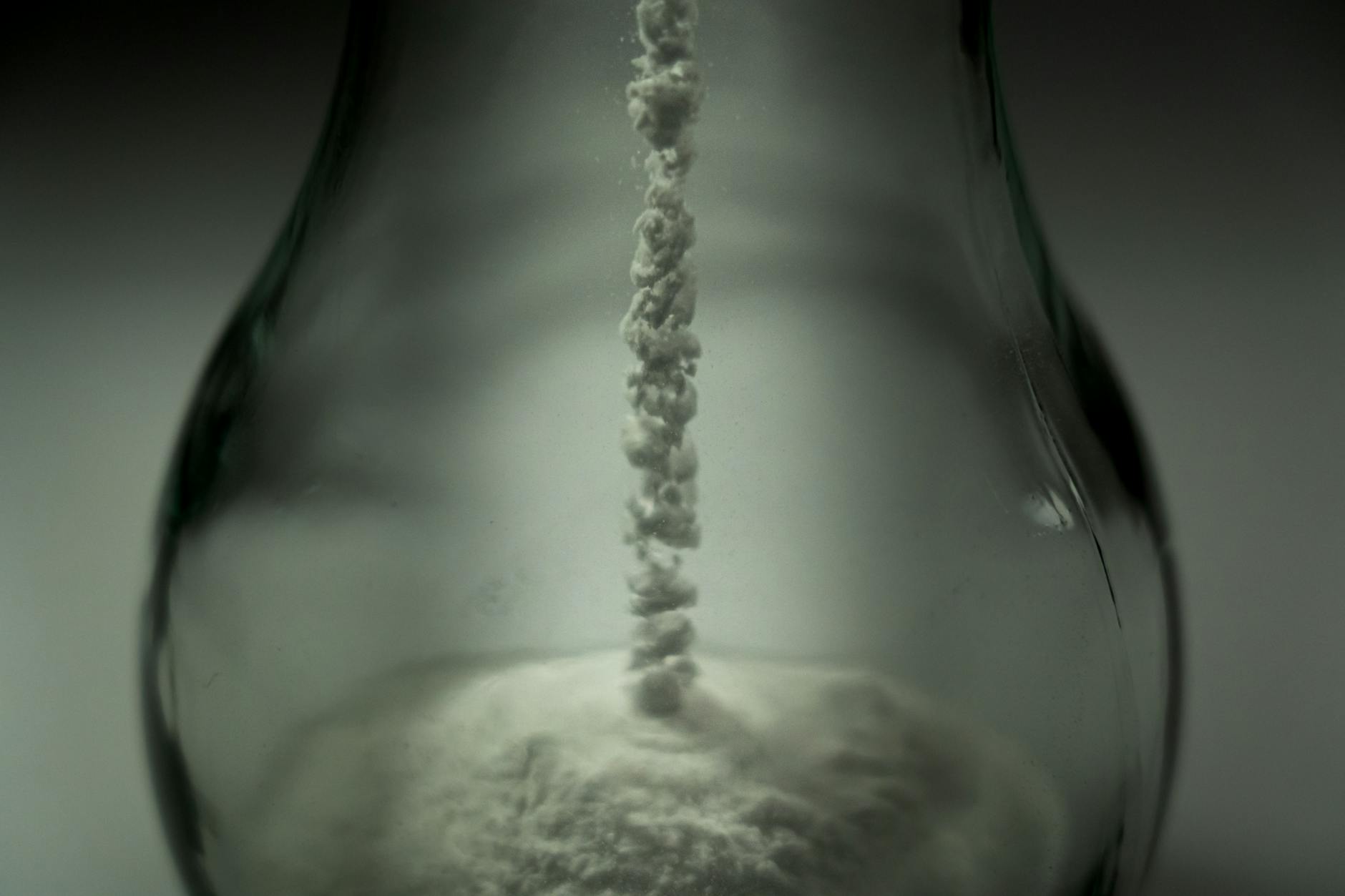 water splash on clear glass container